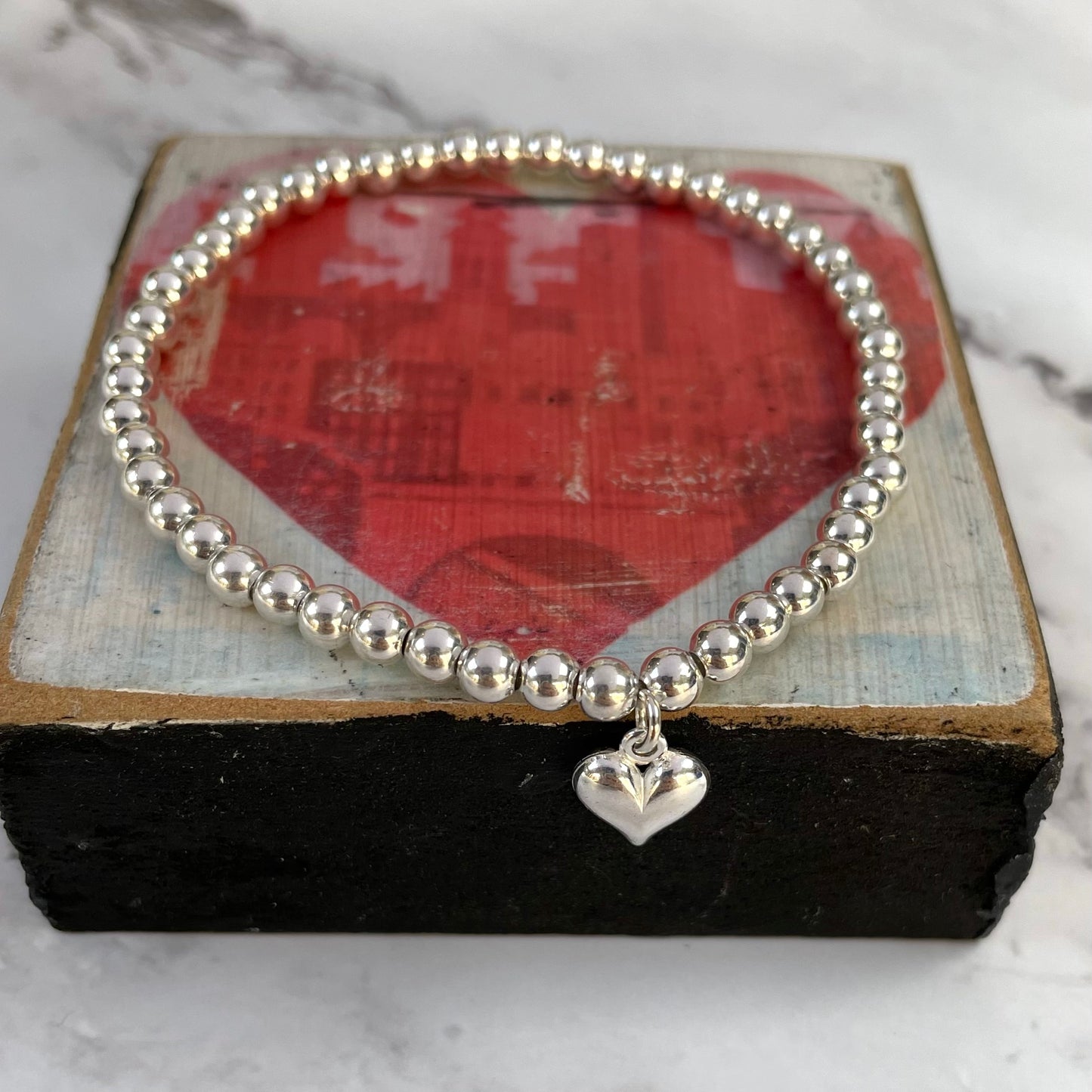 Sterling Silver Plated Beaded Bracelet with Silver Puff Heart Charm