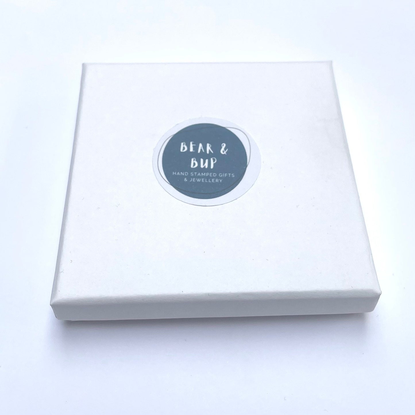 Silver-plated elasticated bead bracelet with silver initial & birthstone charm