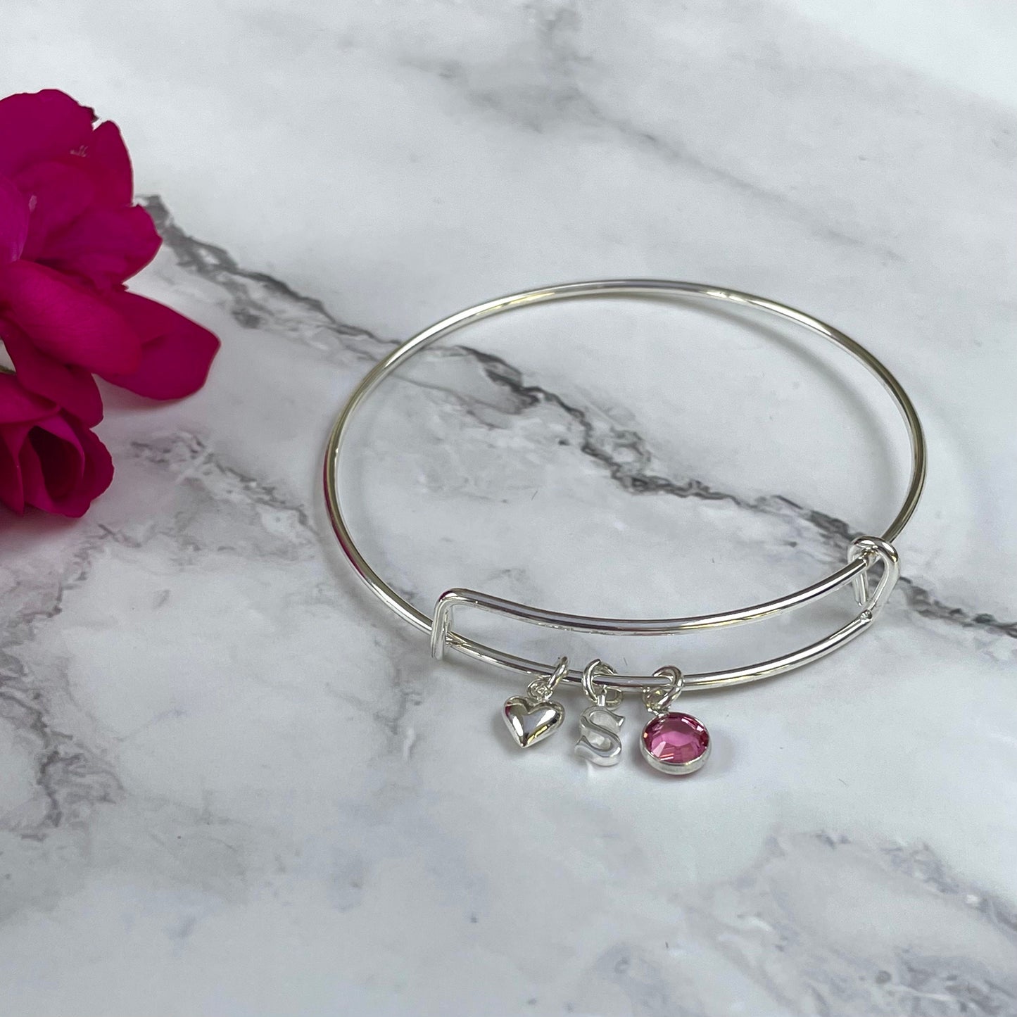 Silver-plated adjustable bangle with initial, birthstone and heart