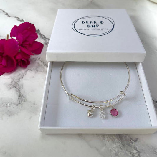 Silver-plated adjustable bangle with initial, birthstone and heart