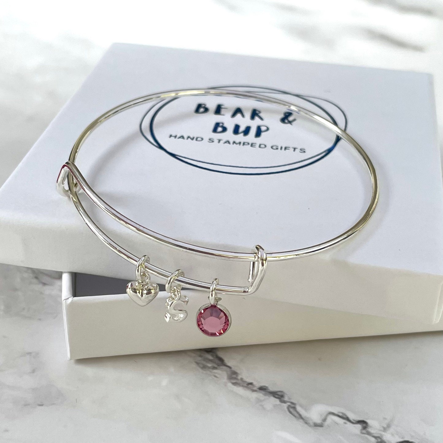 Silver-plated adjustable bangle with initial, birthstone and heart